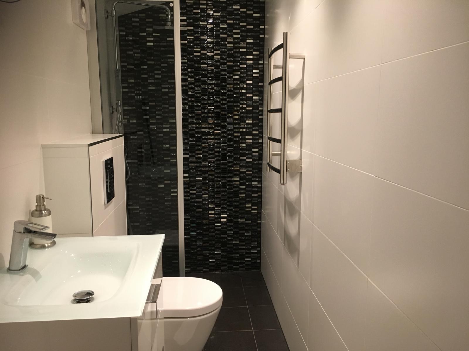 Modern bathroom with mosaic tile shower installation in Birmingham